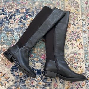 Unworn Cole Haan black leather knee boots with gold detail! New without tags